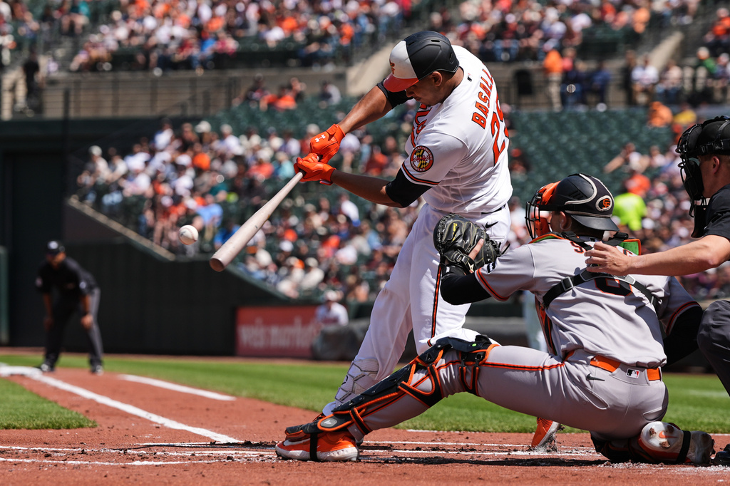 Baltimore Orioles' Samuel Basallo (29) hits a two-run home run during the first inning of a baseball game against the San Francisco Giants, Sunday, April 12, 2026, in Baltimore. (AP Photo/Stephanie Scarbrough)