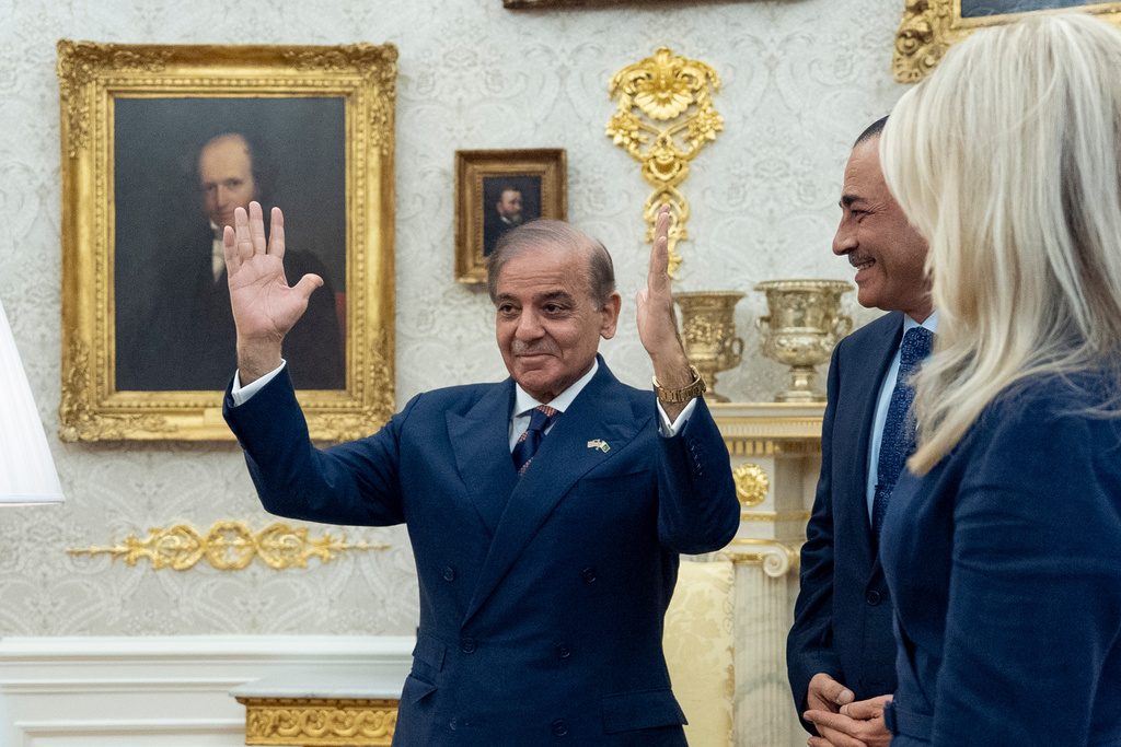 Pakistan Prime Minister Muhammad Shehbaz Sharif, left, and Gen. Syed Asim Munir wait for their meeting with President Donald Trump, in the Oval Office at the White House, Thursday, Sept. 25, 2025, in Washington. (AP Photo/Alex Brandon)
