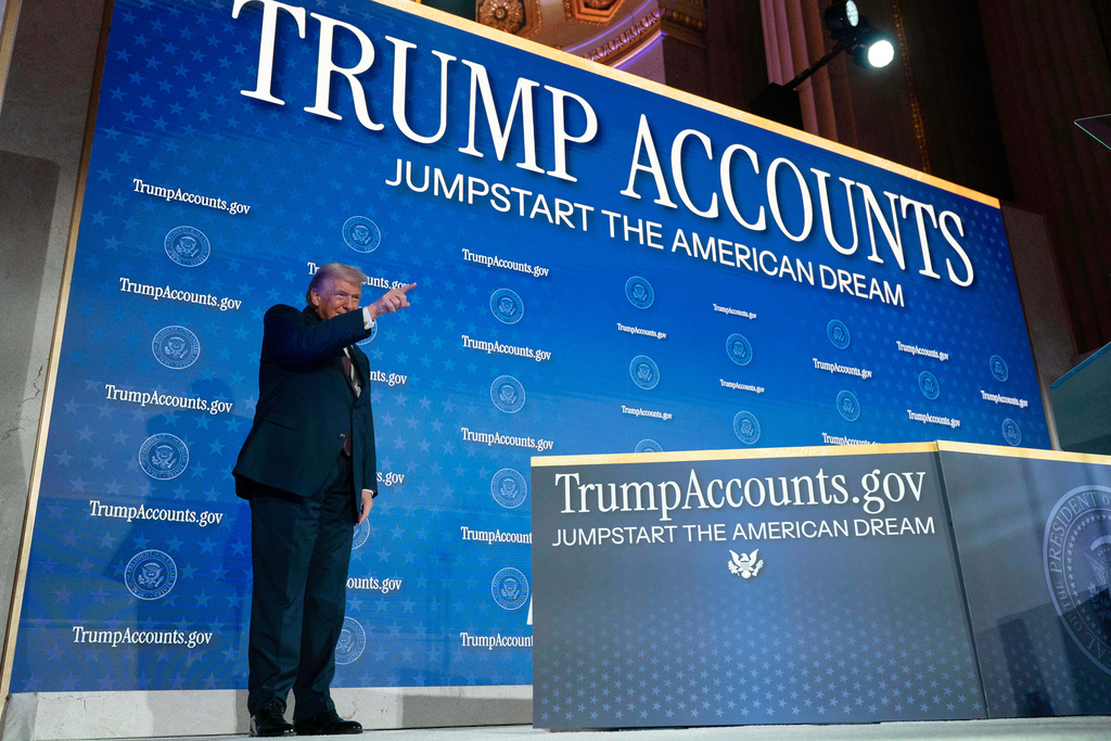 President Donald Trump arrives to the auditorium during the launch of a program known as Trump Accounts at the Andrew W. Mellon Auditorium, Wednesday, Jan. 28, 2026, in Washington. (AP Photo/Jose Luis Magana)
