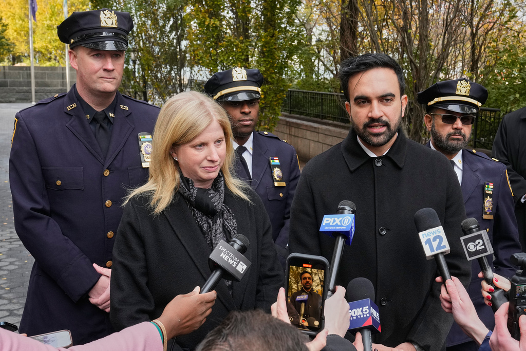 New York Mayor-elect Zohran Mamdani and New York City Police Commissioner Jessica Tisch meet the media after their visit to the New York City Police Memorial, Wednesday, Nov. 19, 2025. (AP Photo/Richard Drew)