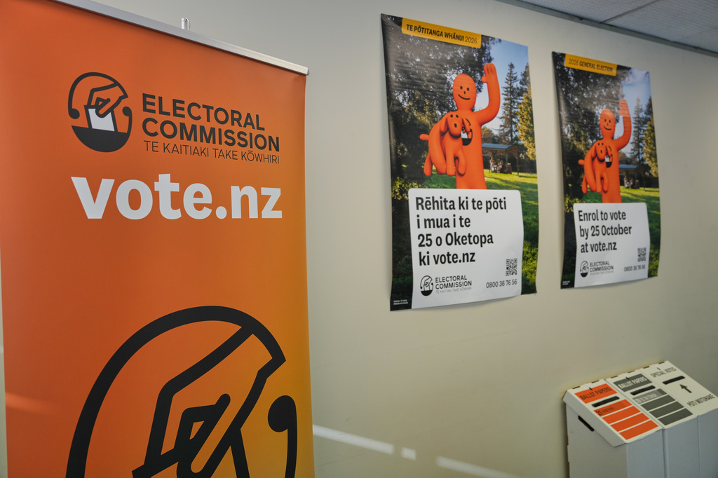 Posters encouraging voters to enrol ahead of New Zealand's elections are seen at the offices of the Electoral Commission in Wellington, New Zealand, Monday, Aug. 10 2026. (AP Photo/Charlotte Graham-McLay)