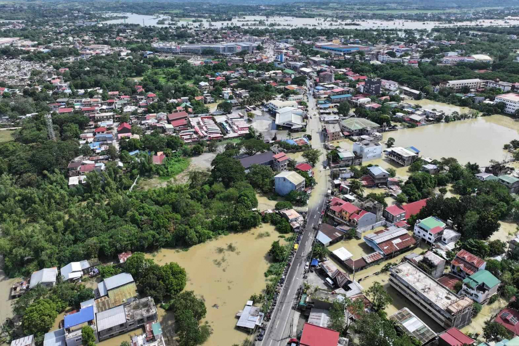 In this photo provided by the Cagayan Police Provincial Office, a town is surrounded by floodwaters after the onslaught of Typhoon Fung-wong in Cagayan province, northern Philippines on Tuesday Nov. 11 2025. (Cagayan Police Provincial Office via AP)