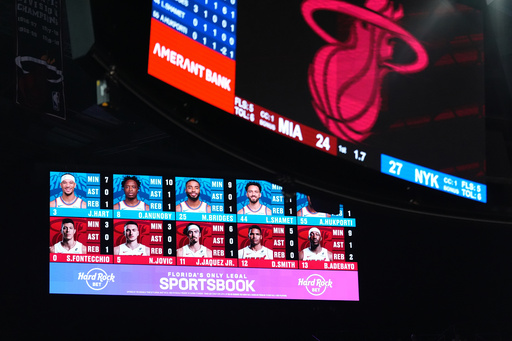 An ad for Hard Rock Bet, a sports betting app, is displayed on a board during the first half of an NBA basketball game between the Miami Heat and the New York Knicks, Sunday, Oct. 26, 2025, in Miami. (AP Photo/Rebecca Blackwell) An ad for Hard Rock Bet, a sports betting app, is displayed on a board during the first half of an NBA basketball game between the Miami Heat and the New York Knicks, Sunday, Oct. 26, 2025, in Miami. (AP Photo/Rebecca Blackwell)