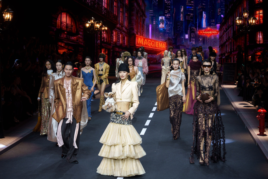 Models wear a creation by Maggie Ma during China Fashion Week (Spring) 2026 in Beijing, China, Wednesday, March 25, 2026. (AP Photo/Vincent Thian)