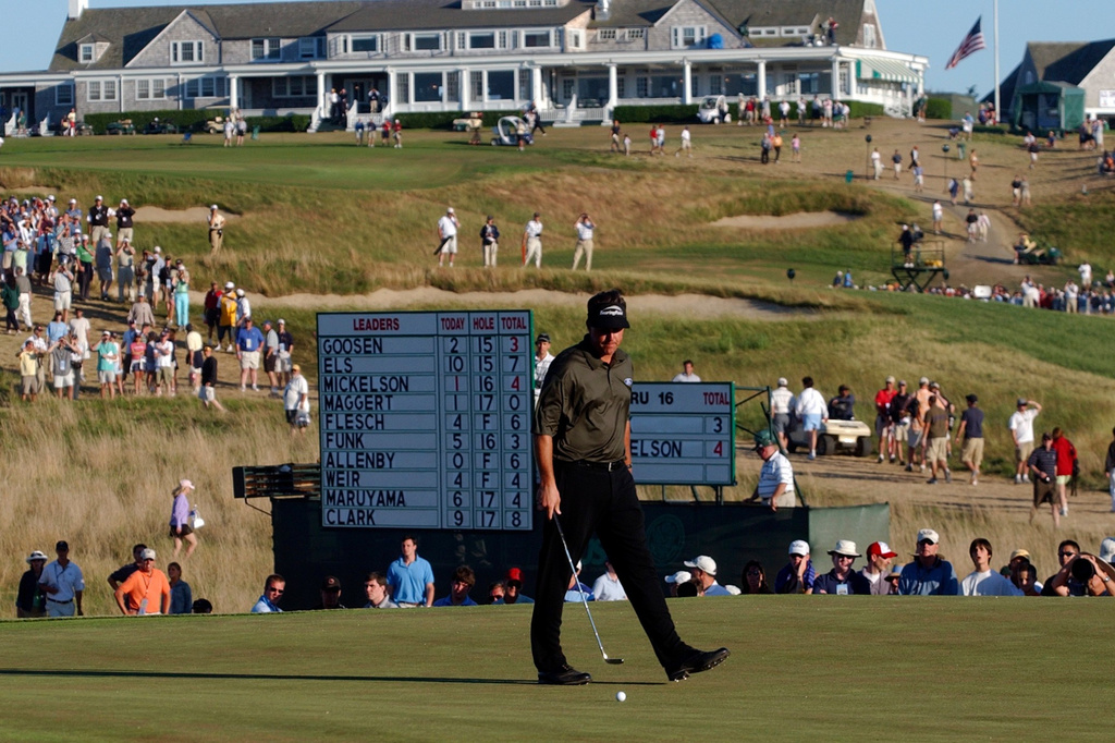 FILE - Phil Mickelson walks around his putt on 17 during the final round of the U.S. Open golf tournament at Shinnecock Hills Golf Club on June 20, 2004, in Southampton, N.Y. (AP Photo/David Duprey, File)