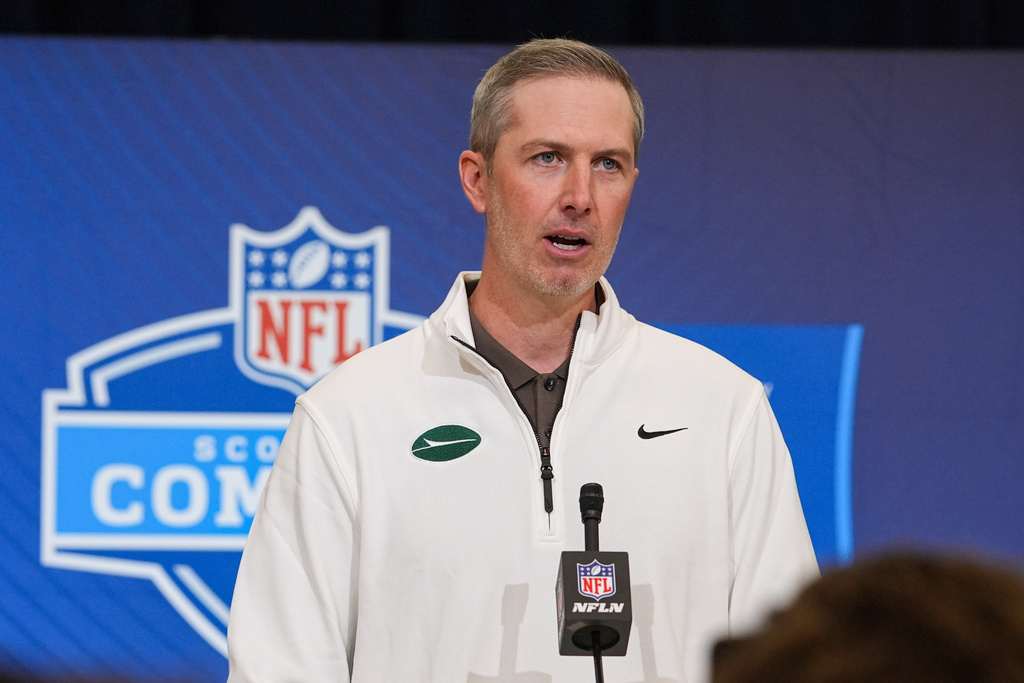 New York Jets general manager Darren Mougey speaks during a press conference at the NFL football scouting combine in Indianapolis, Tuesday, Feb. 24, 2026. (AP Photo/Michael Conroy)
