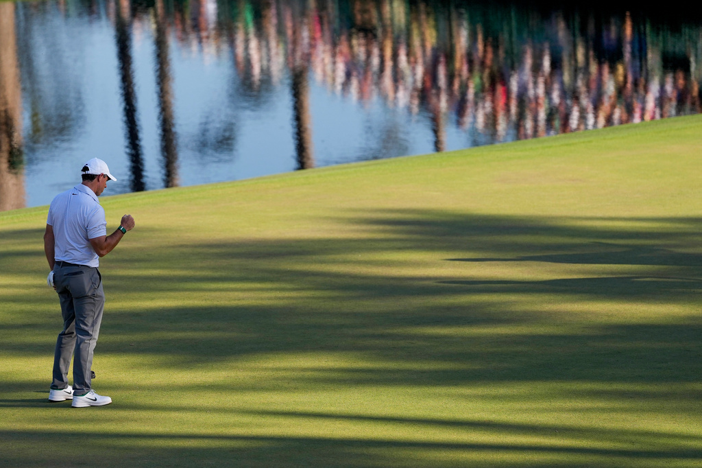 Rory McIlroy, of Northern Ireland, celebrates after a putt on the 16th hole during the second round of the Masters golf tournament at the Augusta National Golf Club, Friday, April 10, 2026, in Augusta, Ga. (AP Photo/Ashley Landis)