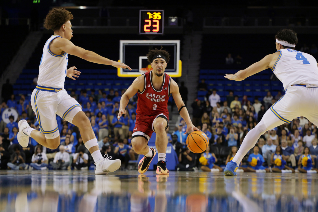 Eastern Washington guard Isaiah Moses (2) drives the ball against UCLA during the first half of an NCAA college basketball game Monday, Nov. 3, 2025, in Los Angeles. (AP Photo/Ethan Swope)