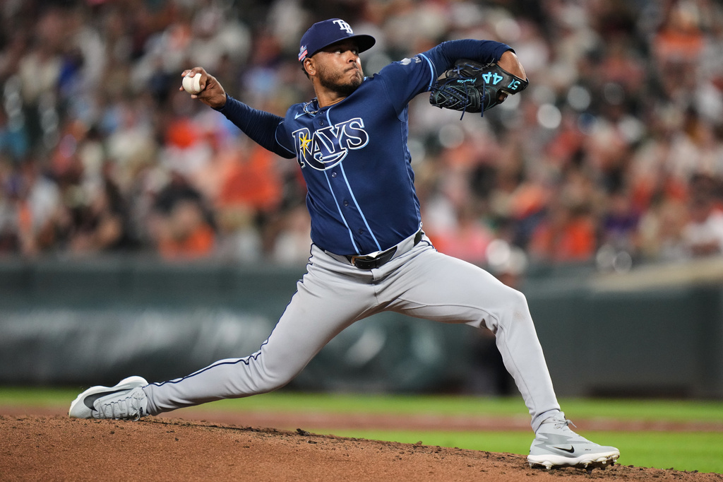 Tampa Bay Rays starting pitcher Freddy Peralta delivers during the third inning of a baseball game against the Baltimore Orioles, Friday, Aug. 21, 2026, in Baltimore. (AP Photo/Stephanie Scarbrough)