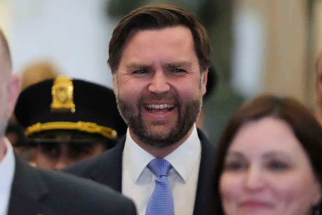 Vice President JD Vance arrives before President Donald Trump delivers the State of the Union address to a joint session of Congress in the House chamber at the U.S. Capitol in Washington, Tuesday, Feb. 24, 2026. (AP Photo/Mark Schiefelbein)