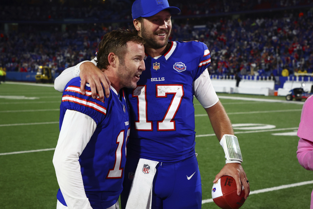 Buffalo Bills quarterback Josh Allen (17) celebrates with kicker Matt Prater (15) after his game-winning field goal against the Baltimore Ravens in an NFL football game in Orchard Park, N.Y., Sunday, Sept. 7, 2025. (AP Photo/Jeffrey T. Barnes)
