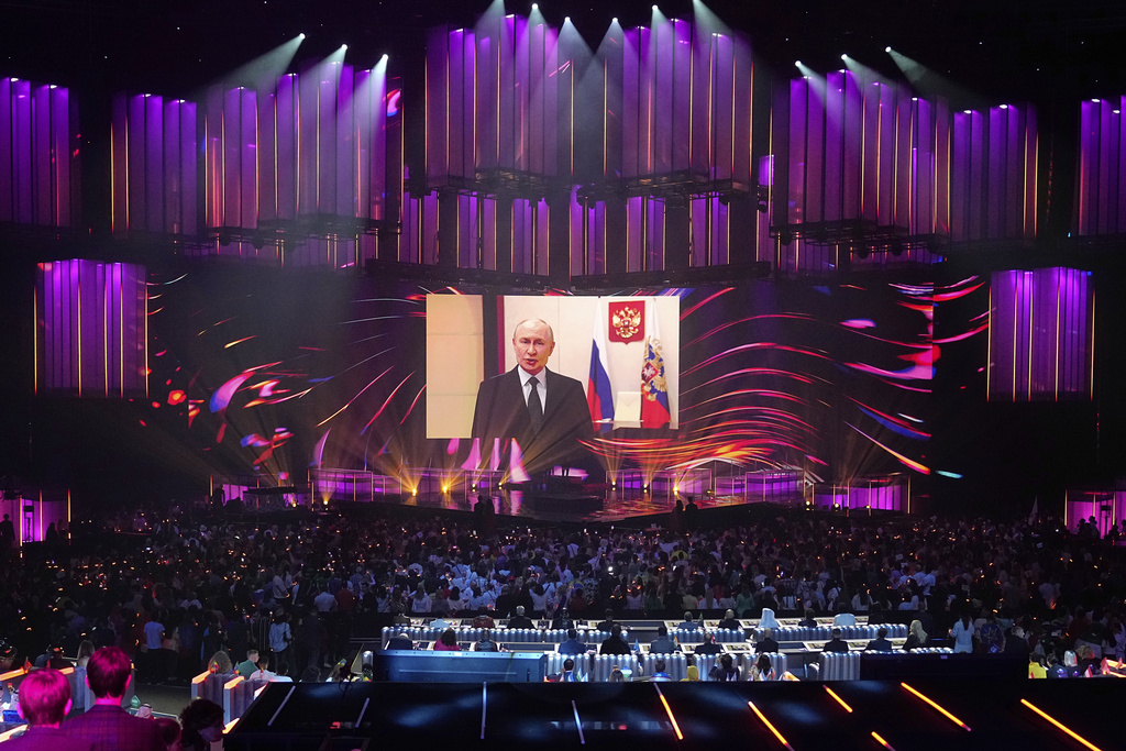 Russian President Vladimir Putin addresses participants and spectators of the International Music Competition "Intervision" via video link at the Live Arena outside Moscow, Russia, Saturday, Sept. 20, 2025. (AP Photo/Alexander Zemlianichenko)