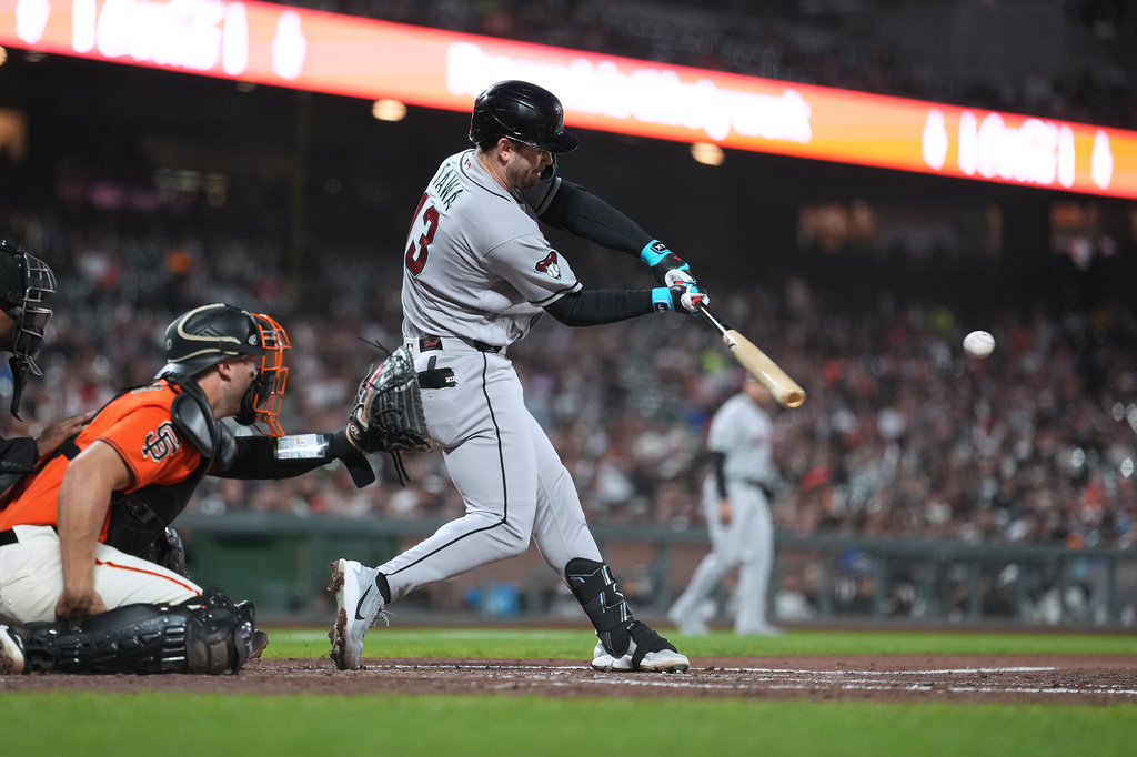 Arizona Diamondbacks' Tim Tawa hits a three-run home run against the San Francisco Giants during the third inning of a baseball game in San Francisco, Friday, Aug. 28, 2026. (AP Photo/Tony Avelar)