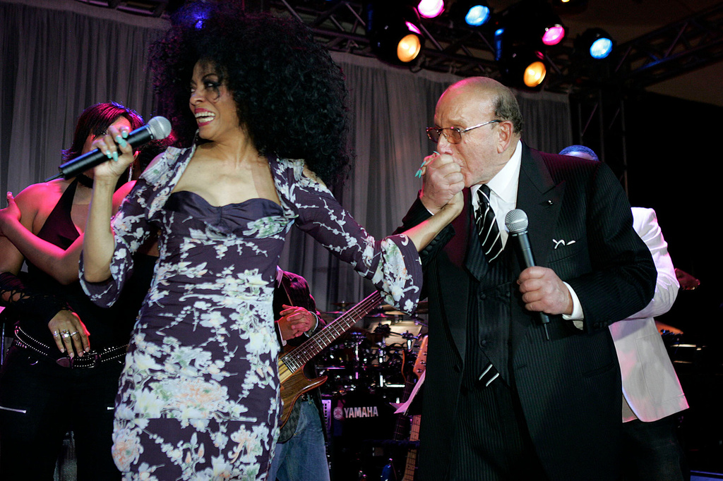 FILE - Clive Davis kisses the hand of Diana Ross at his annual pre- grammy party at the Beverly Hills Hotel in Beverly Hills, Calif. on Saturday Feb. 12, 2005. (AP Photo/Chris Polk)