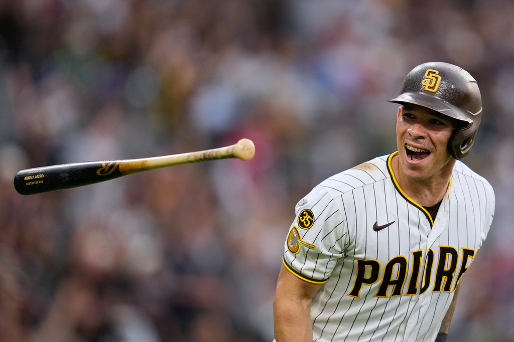 San Diego Padres' Freddy Fermin celebrates after hitting a home run during the third inning of a baseball game against the Cincinnati Reds Monday, June 8, 2026, in San Diego. (AP Photo/Gregory Bull)