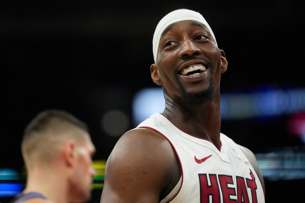 Miami Heat center Bam Adebayo (13) looks back at the bench after drawing a foul from the Chicago Bulls during the second half of an NBA basketball game Thursday, Jan. 29, 2026, in Chicago. (AP Photo/Erin Hooley)