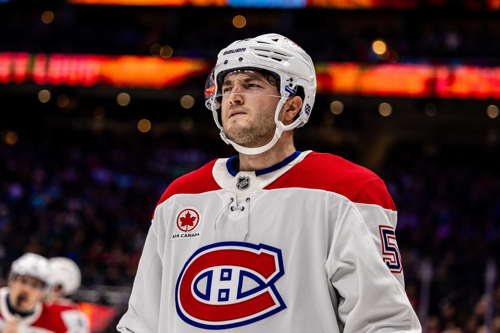 Montreal Canadiens defenseman Noah Dobson reacts during the second period of an NHL hockey game against the Seattle Kraken, Tuesday, Oct. 28, 2025, in Seattle. (AP Photo/Maddy Grassy)