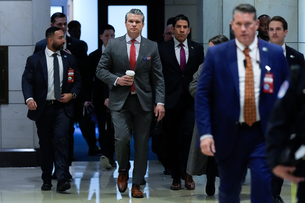 Defense Secretary Pete Hegseth arrives to brief members of Congress on military strikes near Venezuela, Tuesday, Dec. 16, 2025, at the Capitol in Washington. (AP Photo/Julia Demaree Nikhinson)