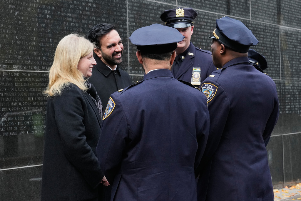 New York Mayor-elect Zohran Mamdani and New York City Police Commissioner Jessica Tisch meet with NYPD officers during their visit the New York City Police Memorial, Wednesday, Nov. 19, 2025. (AP Photo/Richard Drew)