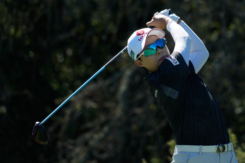 Hyo Joo Kim, of South Korea, hits from the 11th tee during the first round of the LPGA Fortinet Founders Cup golf tournament, Thursday, March 19, 2026, in Menlo Park, Calif. (AP Photo/Jeff Chiu)