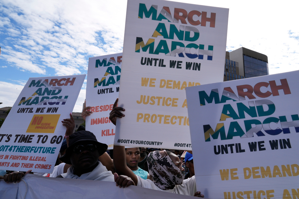 South Africans protest against illegal migration, in Johannesburg, South Africa, Wednesday, April 29, 2026. (AP Photo/Themba Hadebe)