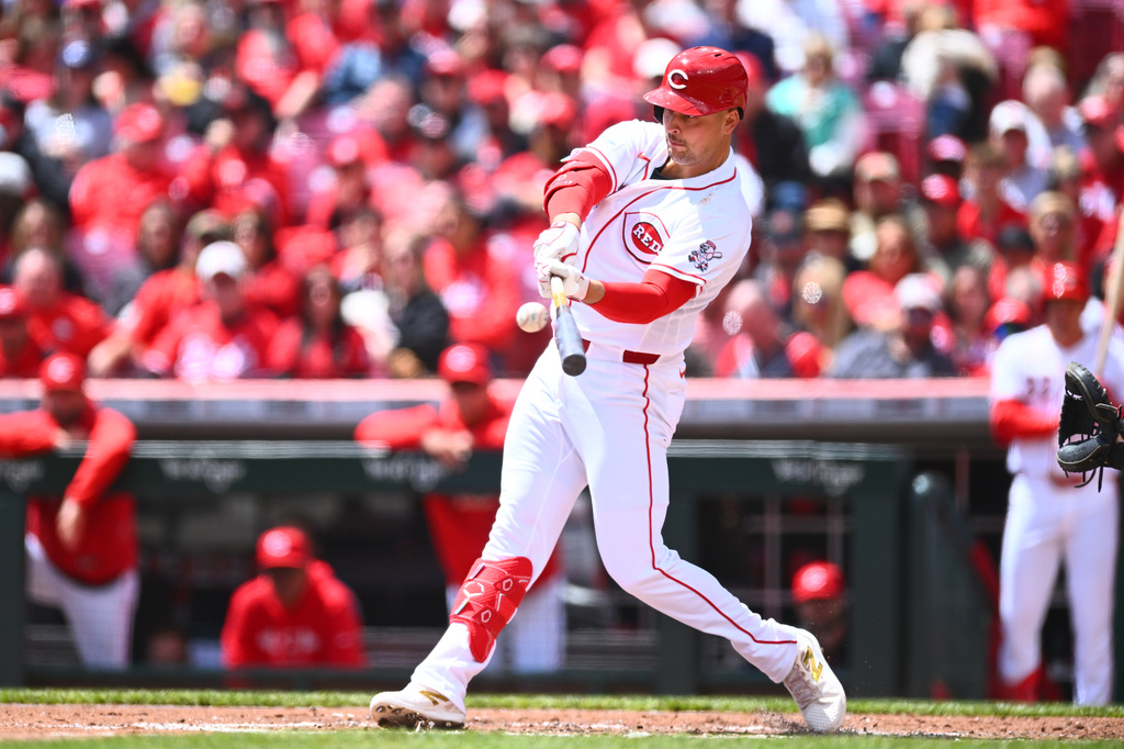Cincinnati Reds' Nathaniel Lowe (31) hits a solo home run during the second inning of a baseball game against the Colorado Rockies in Cincinnati, Thursday, April 30, 2026. (AP Photo/Ben Jackson)