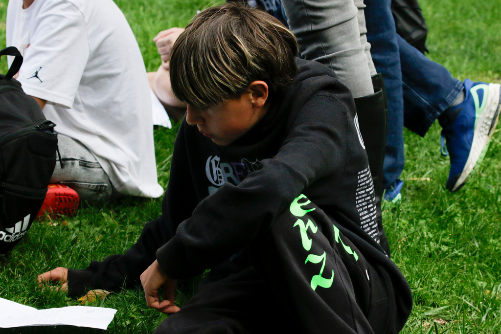 Logan Sandoval, seventh grader looks at a worksheet during a field trip Wednesday, Oct. 8, 2025, in Santa Fe, N.M. (AP Photo/Stacy Thacker)