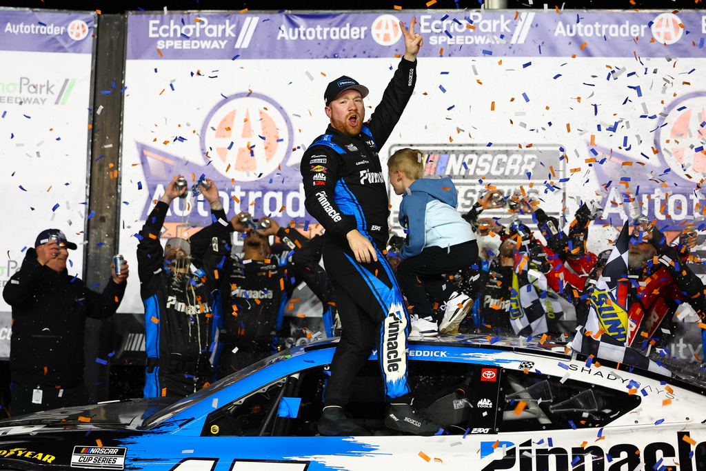 Tyler Reddick reacts after winning a NASCAR Cup Series auto race, Sunday, Feb. 22, 2026, in Hampton, Ga. (AP Photo/Colin Hubbard)