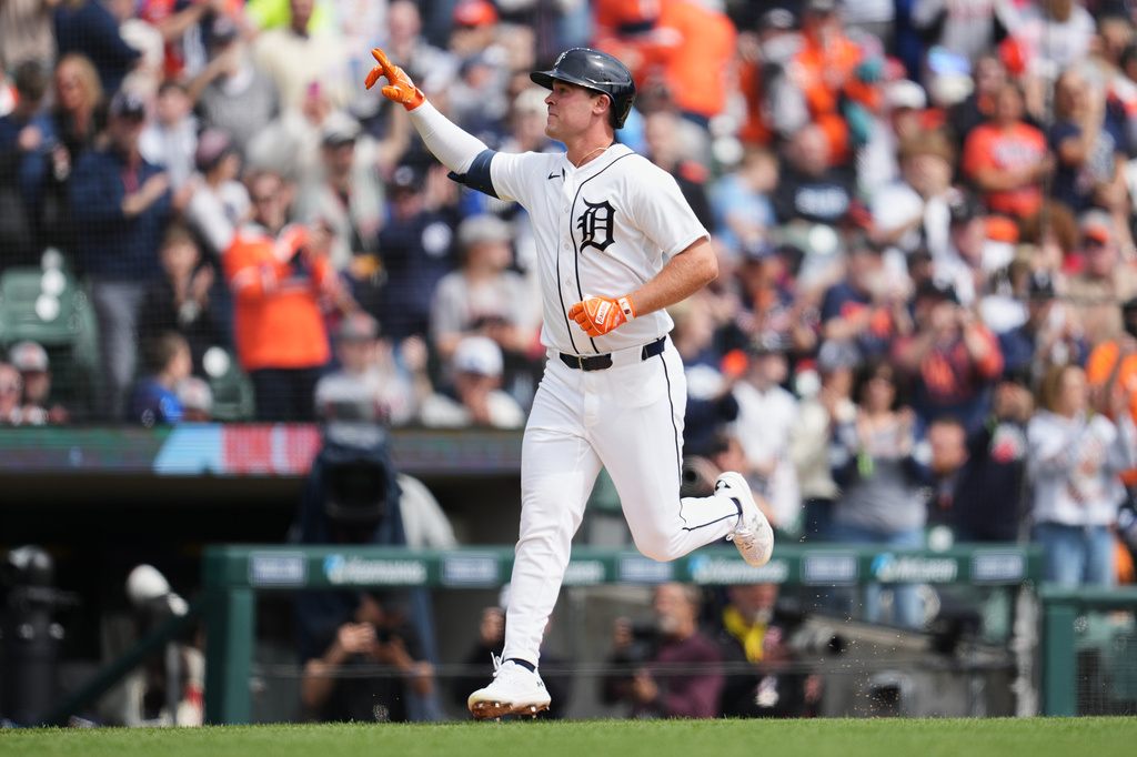 Detroit Tigers' Kerry Carpenter reacts to his two-run home run against the St. Louis Cardinals in the first inning of a baseball game Saturday, April 4, 2026, in Detroit. (AP Photo/Paul Sancya)