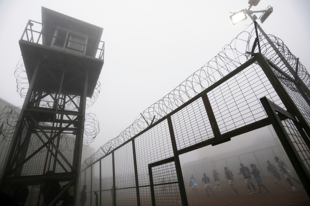 Inmates play rugby at the Valparaiso Prison Complex in Valparaiso, Chile, as part of a social reintegration program, Thursday, Jan. 29, 2026. (AP Photo/Cristobal Escobar)