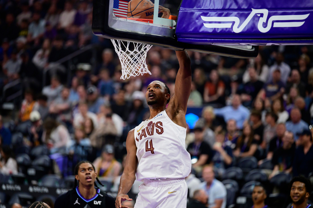 Cleveland Cavaliers center Evan Mobley (4) dunks the ball during the second half of an NBA basketball game against the Utah Jazz, Monday, March 30, 2026, in Salt Lake City. (AP Photo/Tyler Tate)