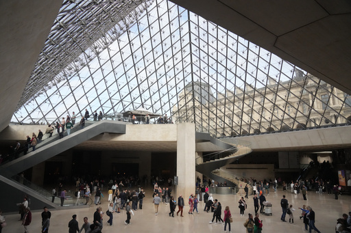 Visitors walk in the lobby of the Louvre museum three days after historic jewels were stolen in a daring daylight heist, Wednesday, Oct. 22, 2025 in Paris. (AP Photo/Thibault Camus) Visitors walk in the lobby of the Louvre museum three days after historic jewels were stolen in a daring daylight heist, Wednesday, Oct. 22, 2025 in Paris. (AP Photo/Thibault Camus)