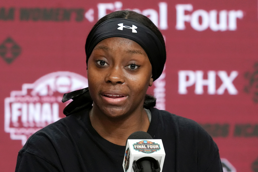 South Carolina's Raven Johnson answers a question during a new conference prior to the national semifinals at the Women's Final Four of the NCAA college basketball tournament, Thursday, April 2, 2026, in Phoenix. (AP Photo/Ross D. Franklin)