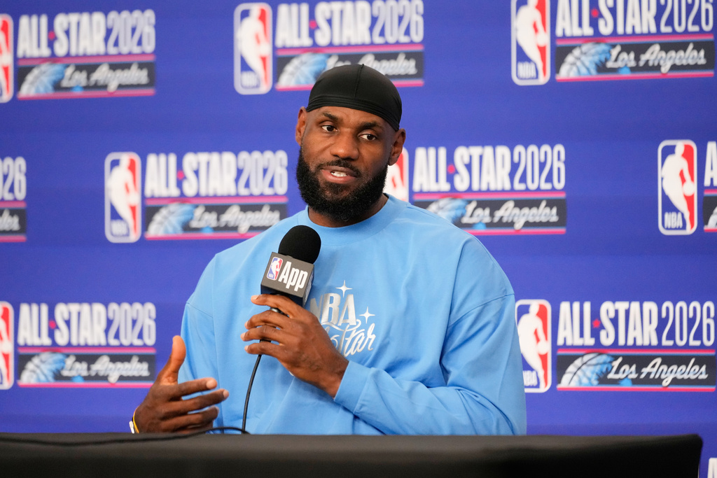 USA Stripes forward LeBron James (23) answers questions before the NBA All-Star basketball game Sunday, Feb. 15, 2026, in Inglewood, Calif. (AP Photo/Mark J. Terrill)