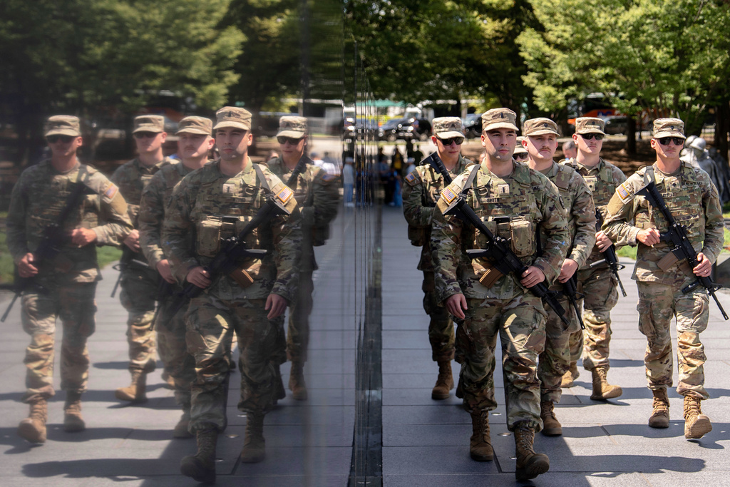 FILE - Armed West Virginia National Guardsmen patrol at the Korean War Veterans Memorial, Aug. 26, 2025, in Washington. (AP Photo/Julia Demaree Nikhinson, File)