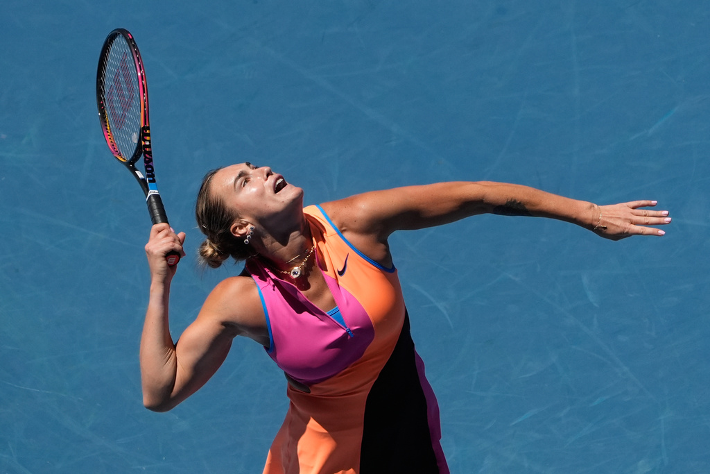 Aryna Sabalenka of Belarus serves to Anastasia Potapova of Austria during their third round match at the Australian Open tennis championship in Melbourne, Australia, Friday, Jan. 23, 2026. (AP Photo/Asanka Brendon Ratnayake)