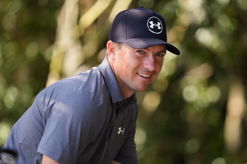 Jordan Spieth climbs into a cart during a practice round for The Players Championship golf tournament Wednesday, March 11, 2026, in Ponte Vedra Beach, Fla. (AP Photo/Gerald Herbert)