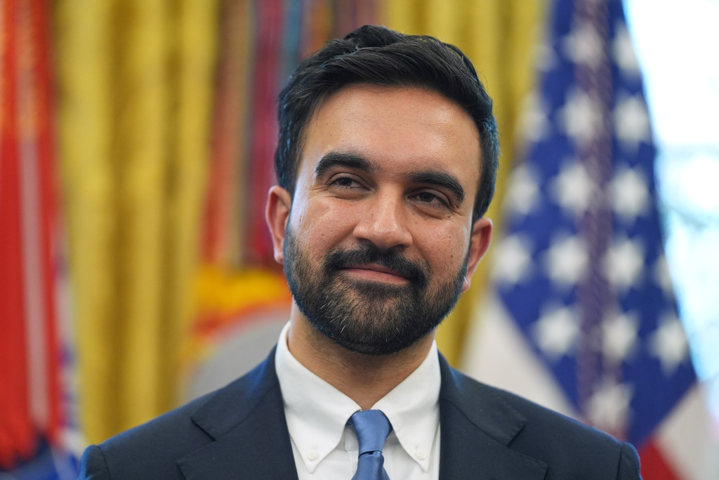New York City Mayor-elect Zohran Mamdani listens as President Donald Trump speaks in the Oval Office of the White House, Friday, Nov. 21, 2025, in Washington. (AP Photo/Evan Vucci)