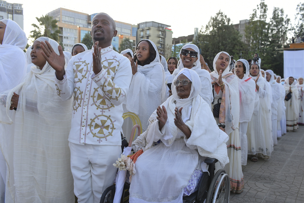 Ethiopian pilgrims pray during a Mass service for Ethiopian Christmas at the Bole Medhane Alem cathedral in Addis Ababa, Ethiopia, Monday, Jan. 6, 2025. (AP Photo)