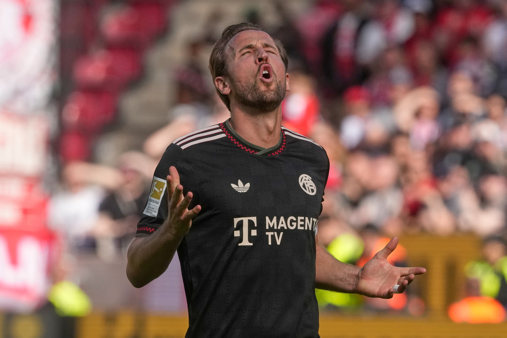 Bayern's Harry Kane reacts during a Bundeliga soccer match between Mainz and Bayern in Mainz,Germany, Saturday, April 25, 2026. (AP Photo/Michael Probst)