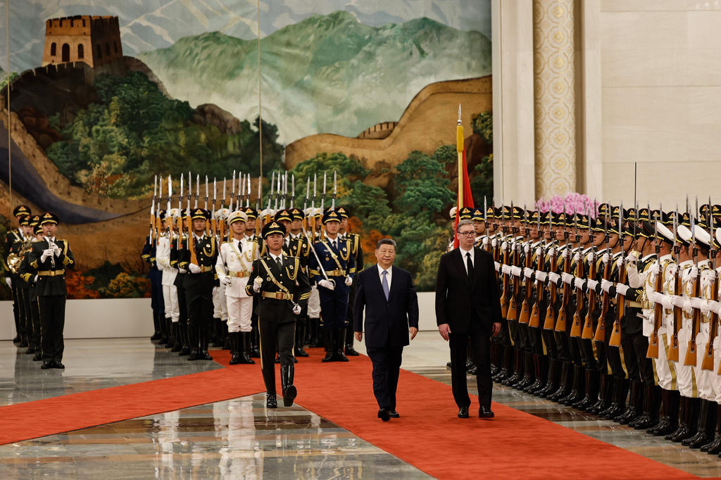Chinese President Xi Jinping and Serbian President Aleksandar Vucic, right, review the honour guard a welcoming ceremony at the Great Hall of the People, in Beijing, China, Monday May 25, 2026. (Tingshu Wang/Pool Photo via AP)