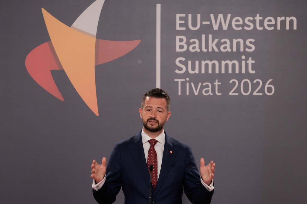 Montenegro's President Jakov Milatovic talks to the media after the EU-Western Balkans summit in the Montenegrin coastal town of Tivat, Friday, June 5, 2026. (AP Photo/Risto Bozovic)
