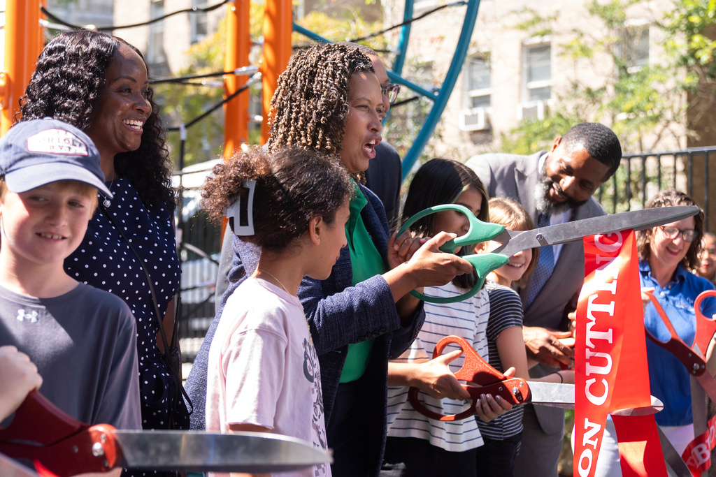 District of Columbia Mayor Muriel Bowser, center, attends a celebration of the first day of school at Oyster-Adams Bilingual School Monday, Aug. 25, 2025, in Washington. (AP Photo/Manuel Balce Ceneta)