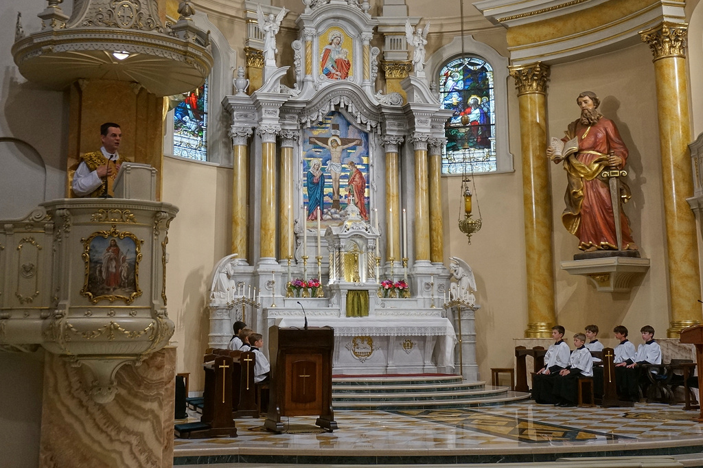 The Rev. John Ubel, pastor of the Church of Saint Agnes, preaches his homily about faithfulness to both tradition and the Vatican during one of the Catholic parish’s Latin Masses in St. Paul, Minn., Sunday, June 28, 2026. (AP Photo/Giovanna Dell’Orto)