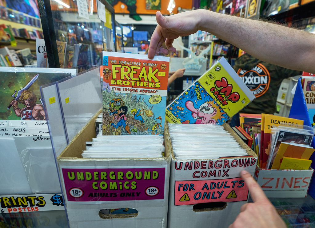 Underground Comics marked "For Adults Only" are displayed at Golden Apple Comics store, in Los Angeles, Tuesday, Nov. 18, 2025. (AP Photo/Damian Dovarganes)