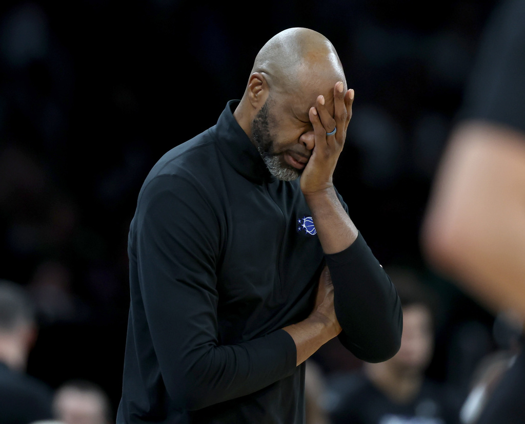 Orlando Magic Head Coach Jamahl Mosley reacts to a foul on his team during the second half of an NBA basketball game against the Boston Celtics, Sunday, April 12, 2026, in Boston. (AP Photo/Mark Stockwell)