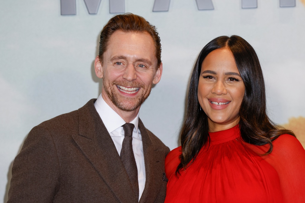 FILE - Tom Hiddleston and Zawe Ashton pose for photographers upon arrival at the Season 2 UK Premiere of The Night Manager in London, England, Wednesday, Dec. 10, 2025. (Photo by Millie Turner/Invision/AP, File)