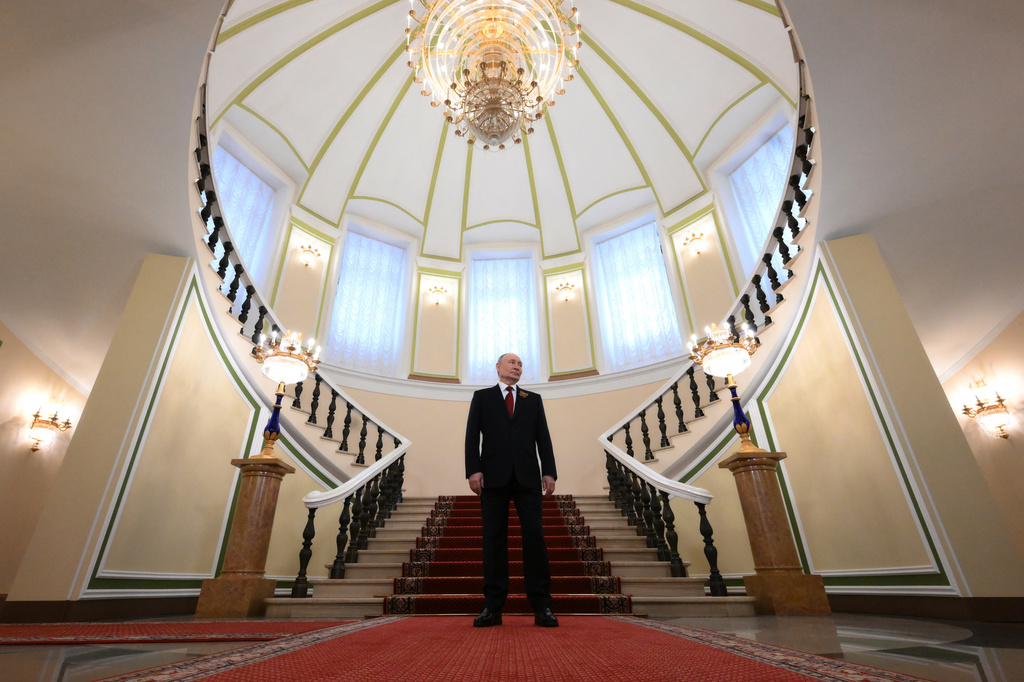 Russian President Vladimir Putin waits to greet heads of foreign delegations attend a reception marking the 81st anniversary of the victory over Nazi Germany in WWII, at the Kremlin in Moscow, Saturday, May 9, 2026. (Grigory Sysoev, Sputnik, Kremlin Pool Photo via AP)