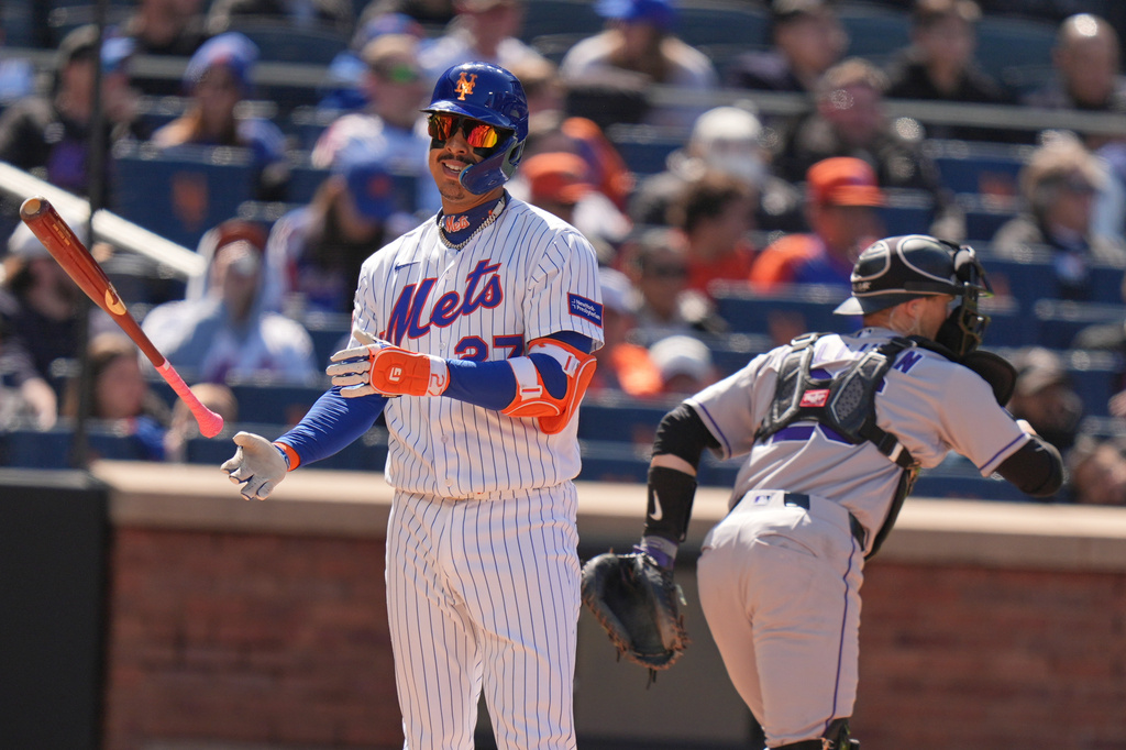 New York Mets' Mark Vientos reacts after striking out to end the sixth inning of the first baseball game of a doubleheader against the Colorado Rockies, Sunday, April 26, 2026, in New York. (AP Photo/Seth Wenig)