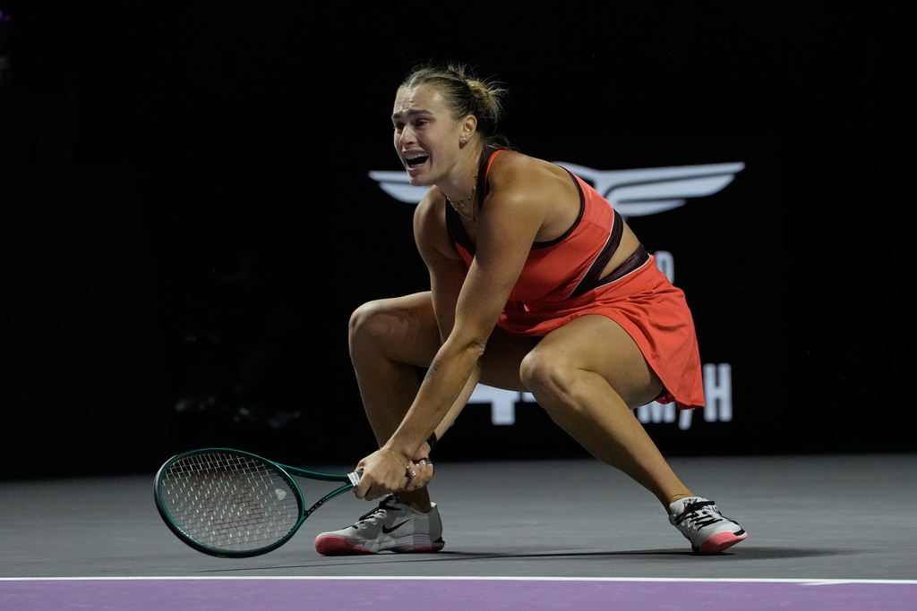 Aryna Sabalenka of Belarus reacts against Elena Rybakina of Kazakhstan during their women's final singles match of the WTA finals in Riyadh, Saudi Arabia, Saturday, Nov. 8, 2025. (AP Photo/ Fatima Shbair)